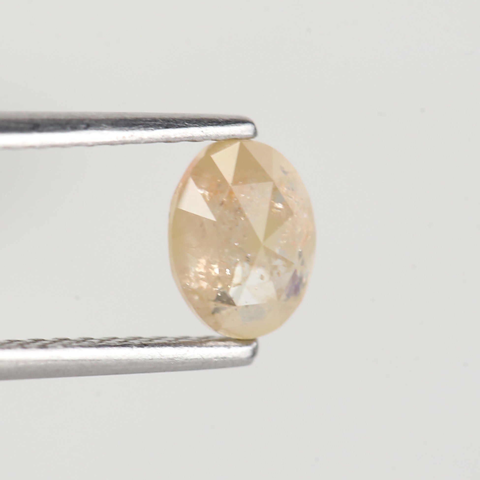 0.80 Carat Natural Yellow Oval Cut Salt and Pepper Diamond 6.2 MM