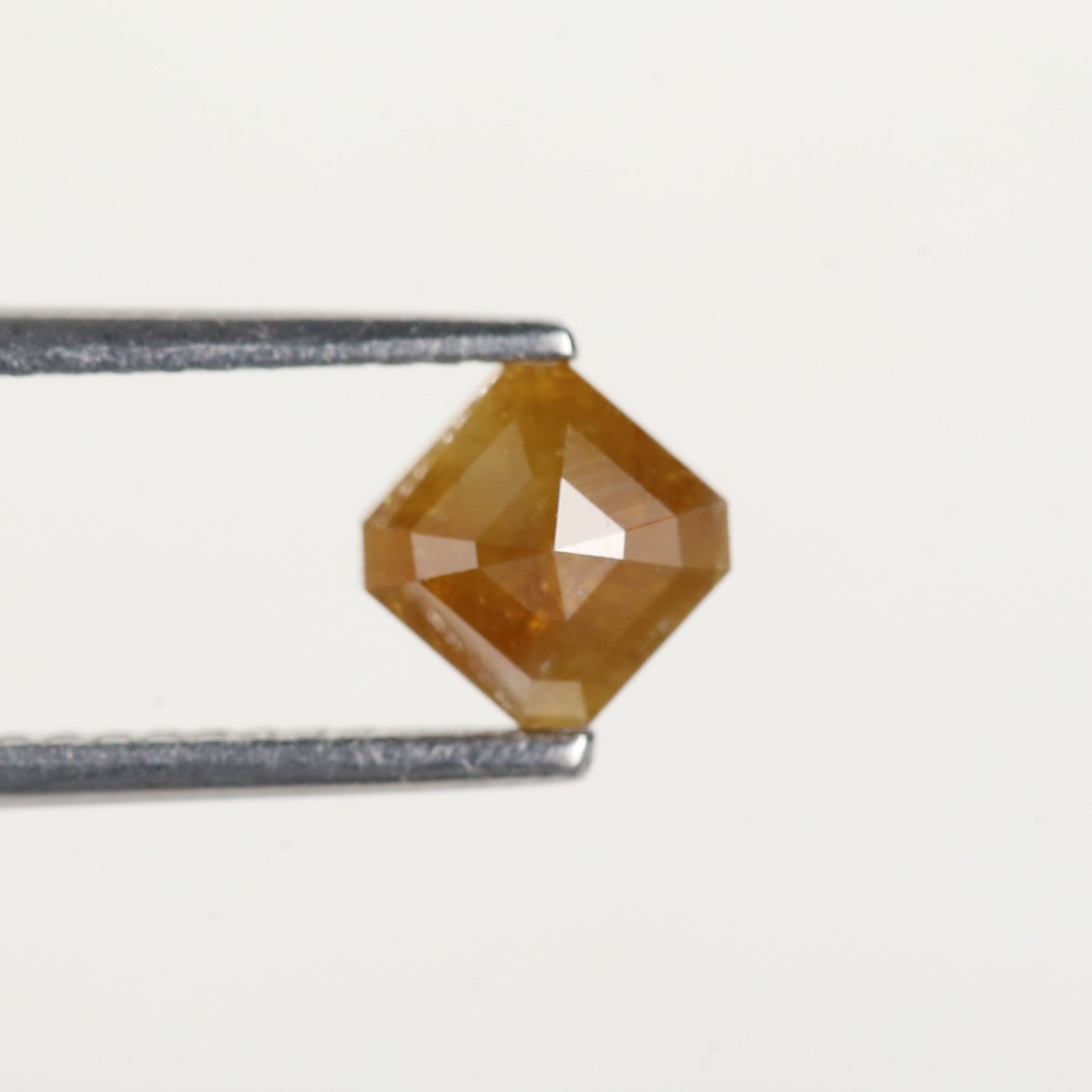 0.67 Carat Asscher Cut Yellow Salt and Pepper Diamond 5 MM