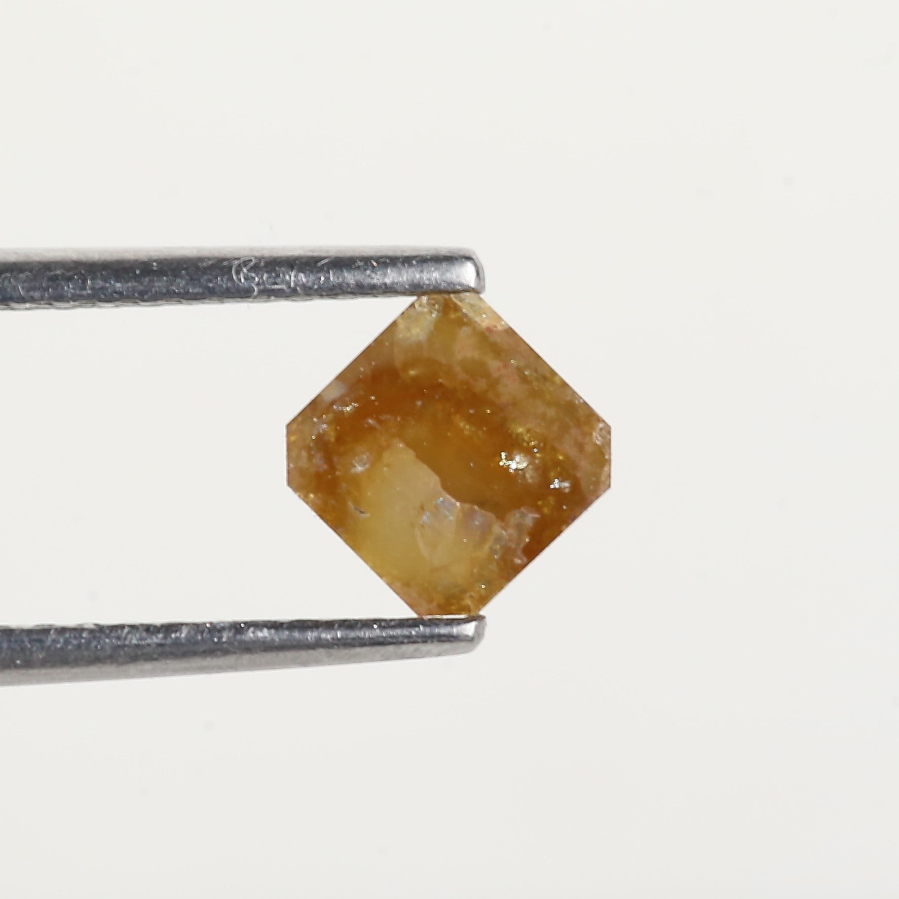 0.67 Carat Asscher Cut Yellow Salt and Pepper Diamond 5 MM