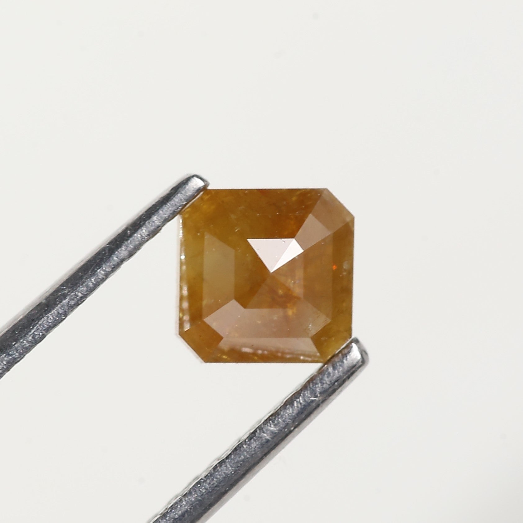 0.67 Carat Asscher Cut Yellow Salt and Pepper Diamond 5 MM