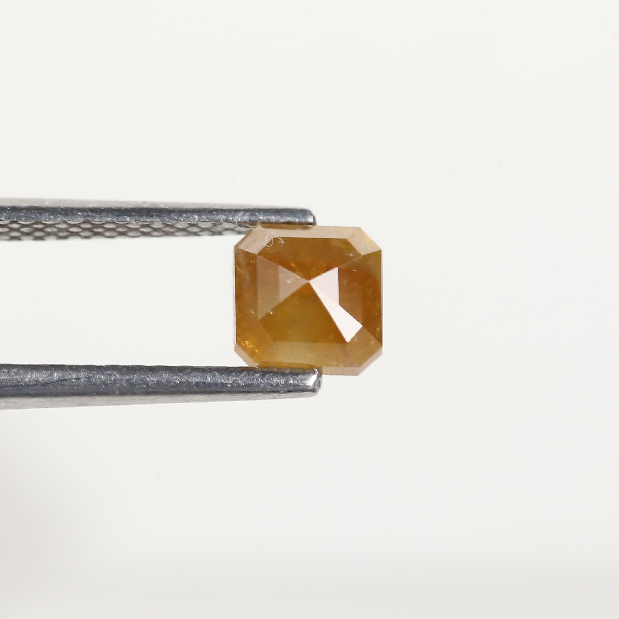 0.67 Carat Asscher Cut Yellow Salt and Pepper Diamond 5 MM