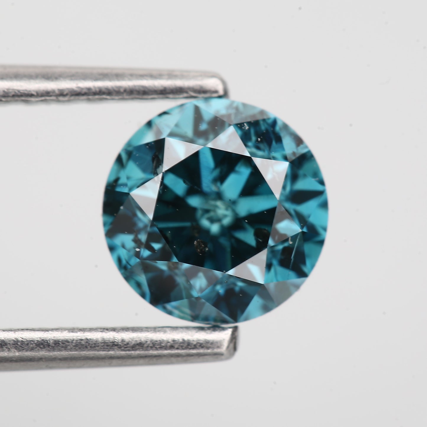 0.81 Carat Fancy Blue Diamond Round Cut Natural Loose Diamond 5.7 MM - Blackdiamond