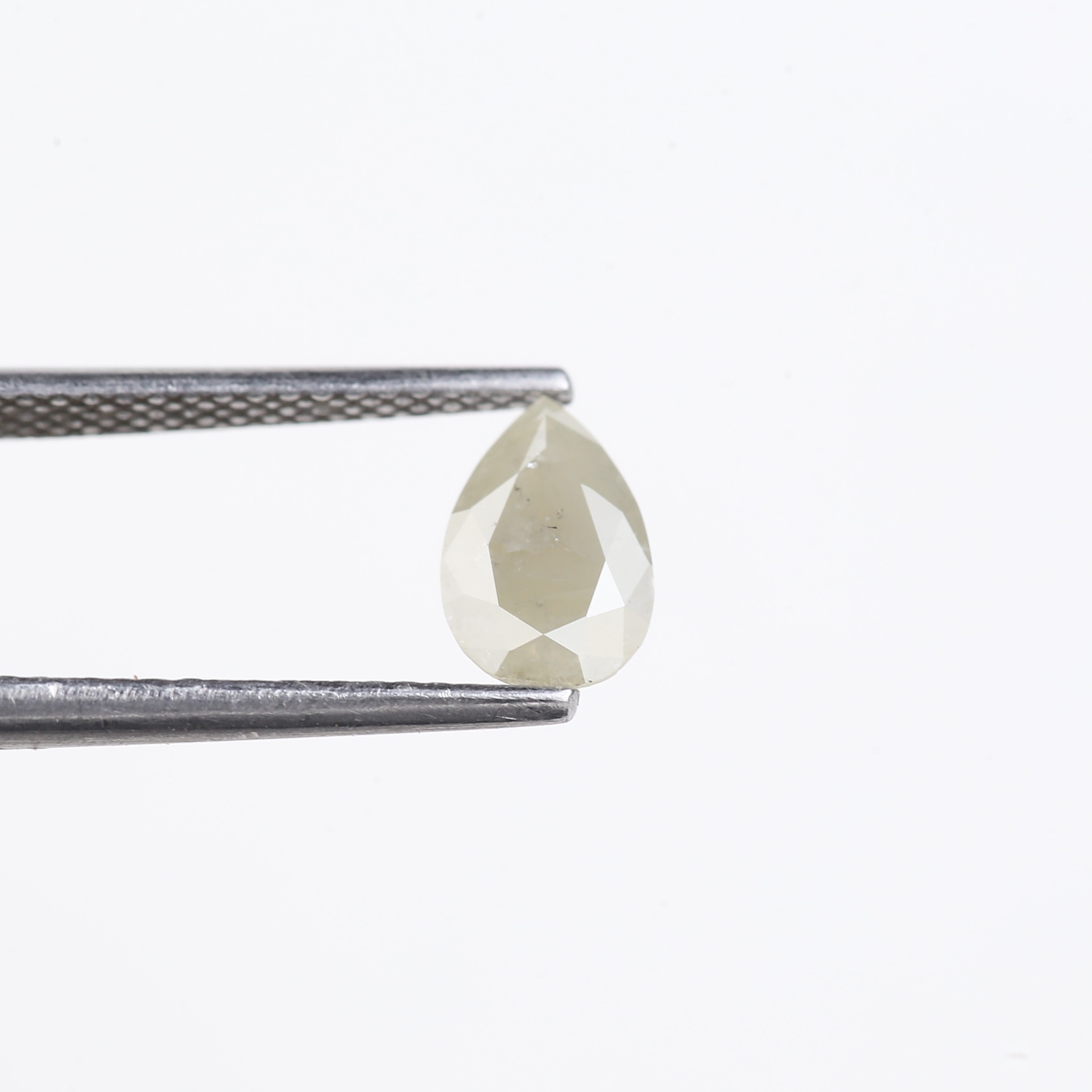 0.66 Carat Natural Milky Grey Pear Cut Salt And Pepper Diamond 7.85 MM