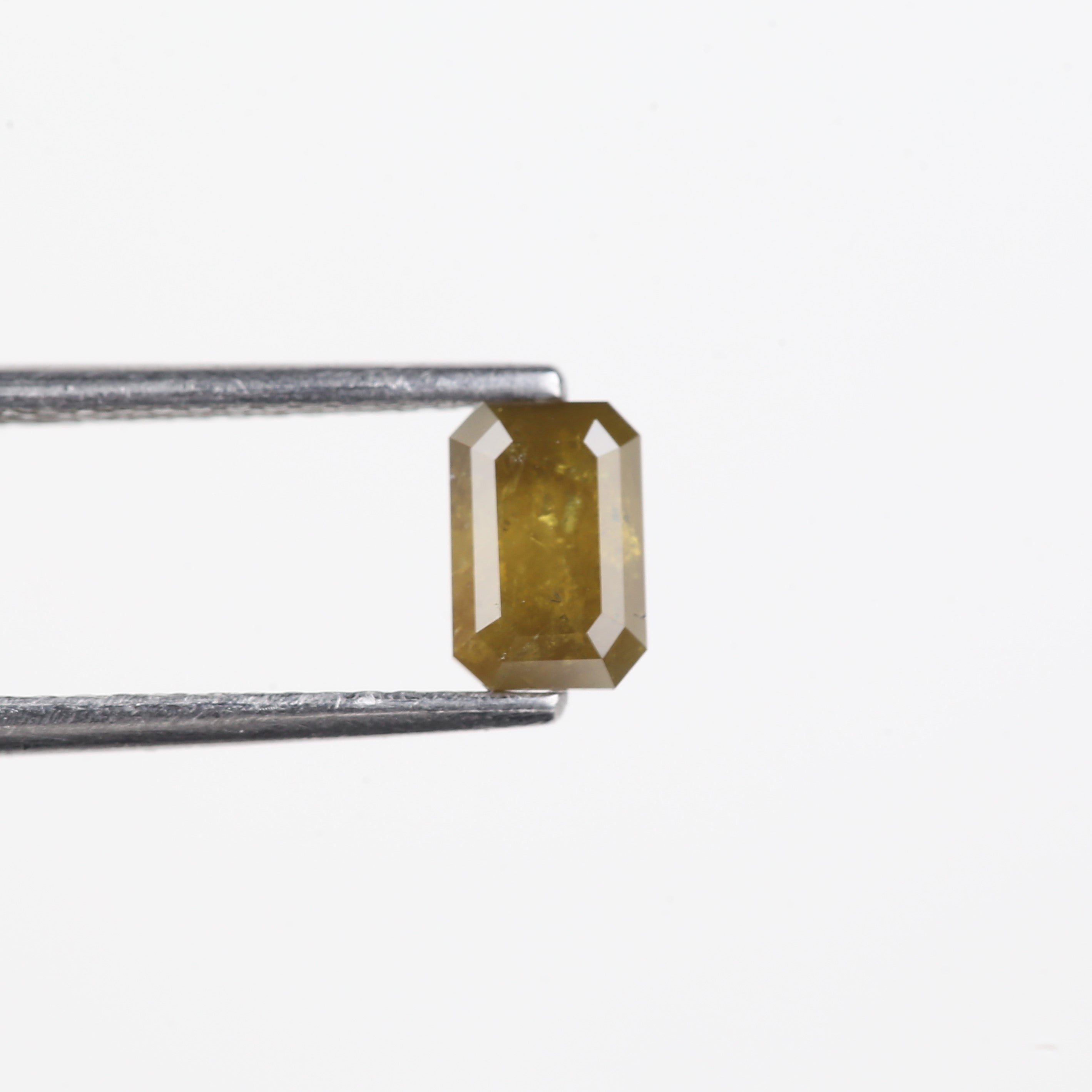 0.72 Carat Natural Yellow Emerald Cut Salt And Pepper Diamond 6.16 MM