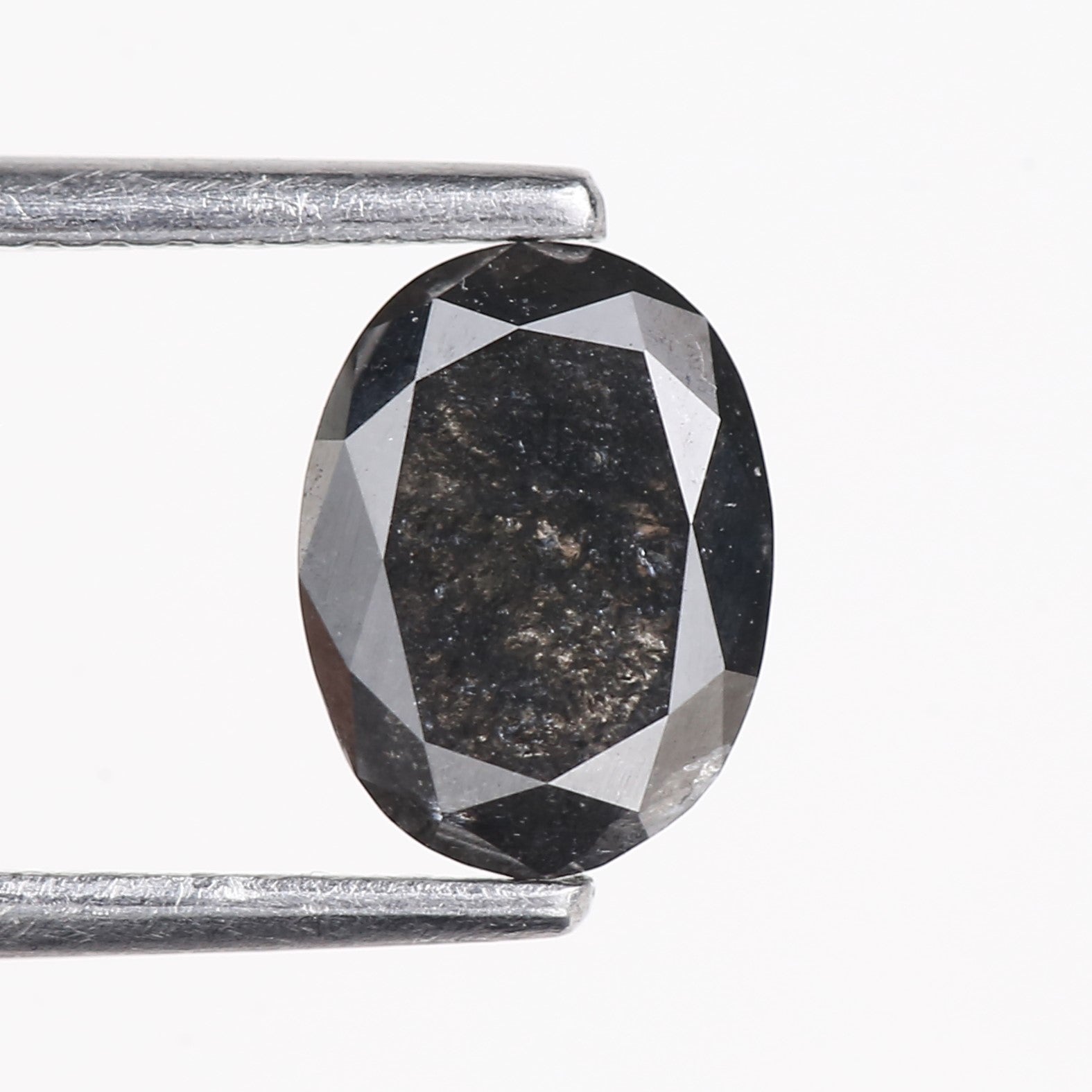 0.99 Carat Natural Dark Gray Oval Cut Salt And Pepper Diamond 7.50 MM
