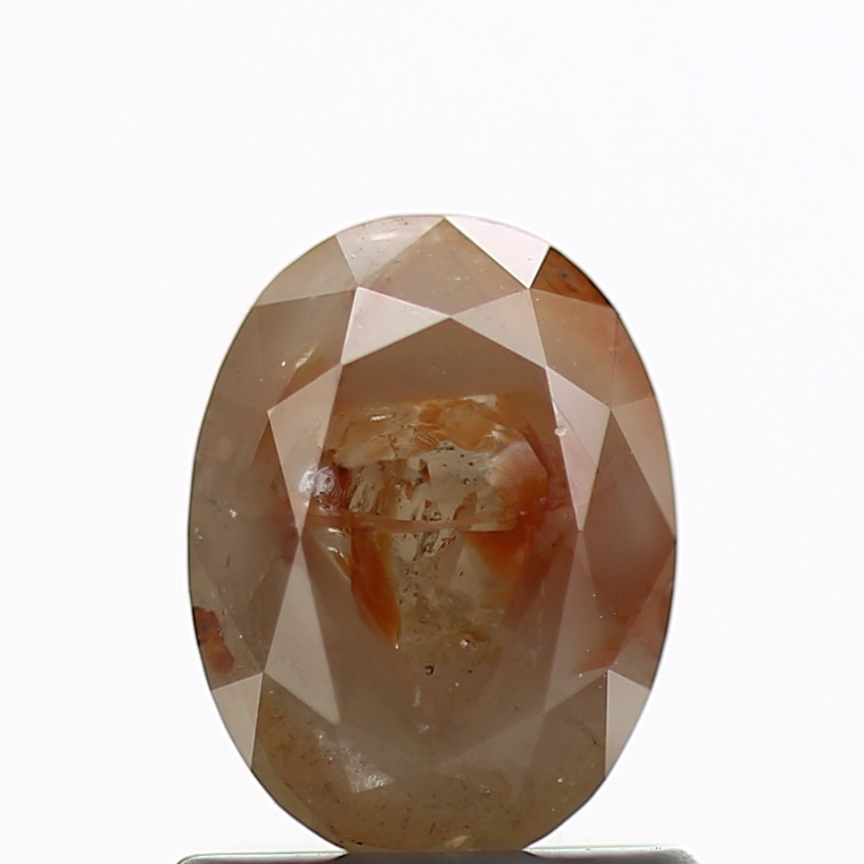 Natural Oval Shaped Orange 1 carat Salt And Pepper Diamond 7 MM