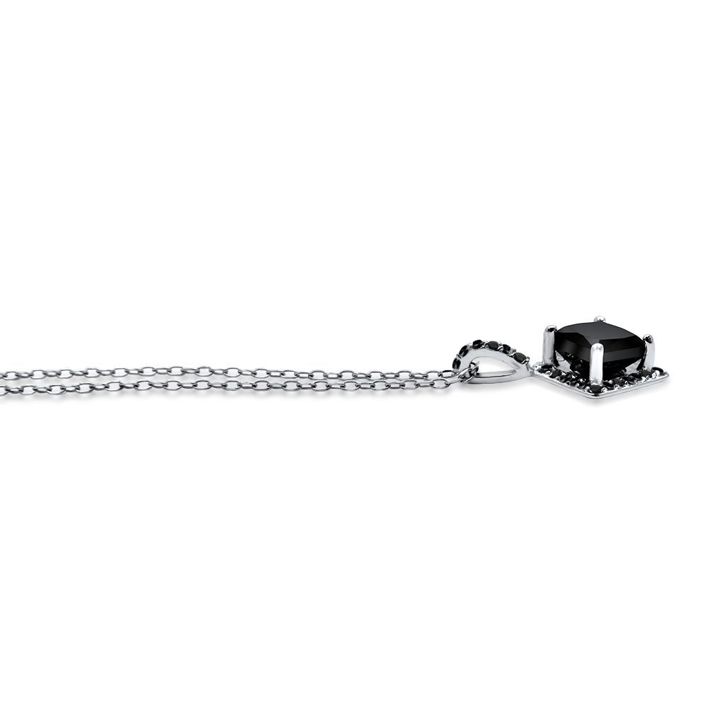 Necklace with a black gemstone pendant on a white background