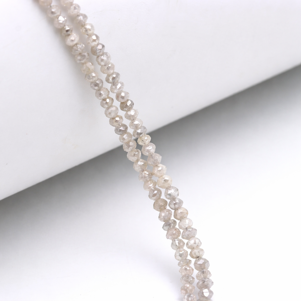 Pearl necklace on a white surface