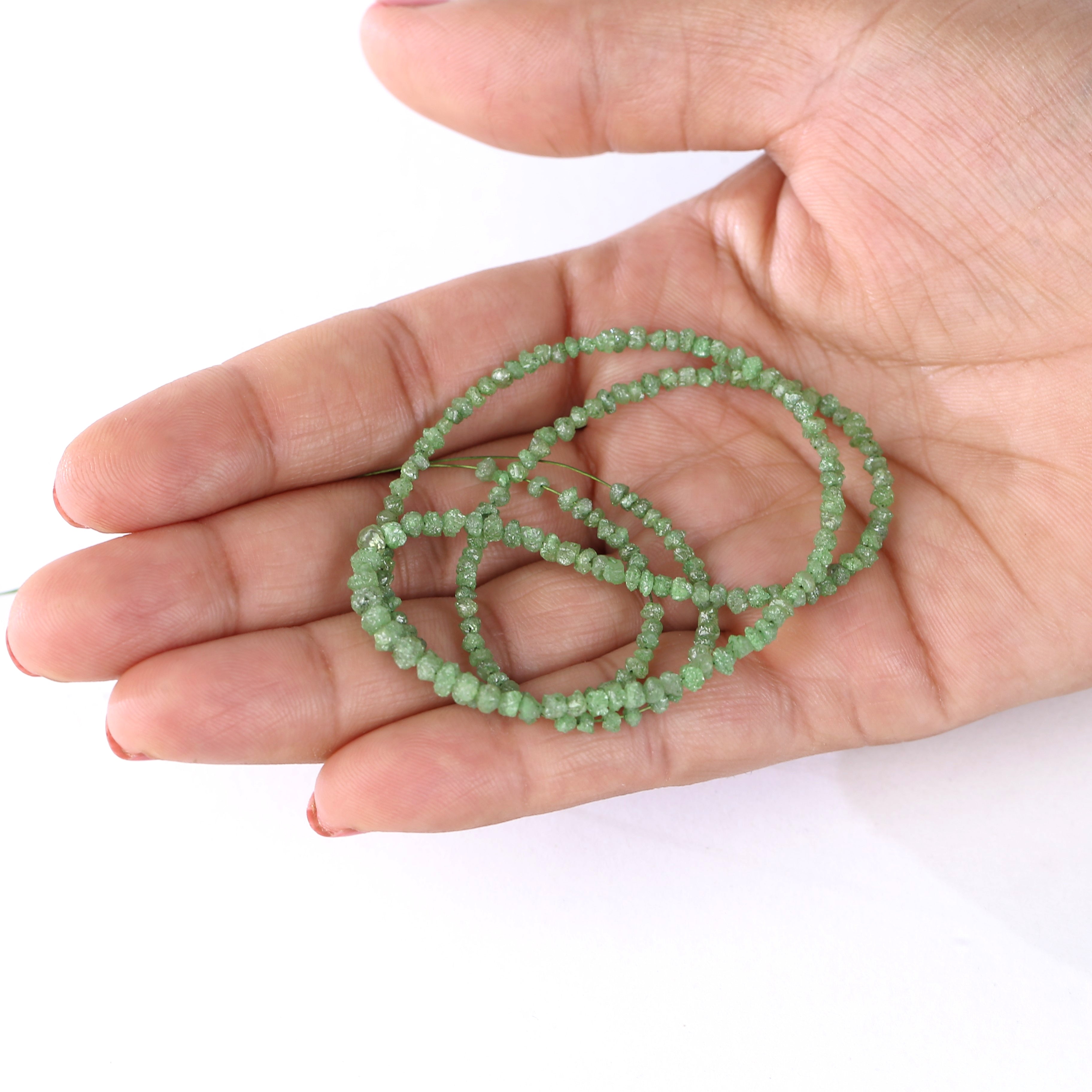 Hand-cut raw green diamonds strung for DIY jewelry