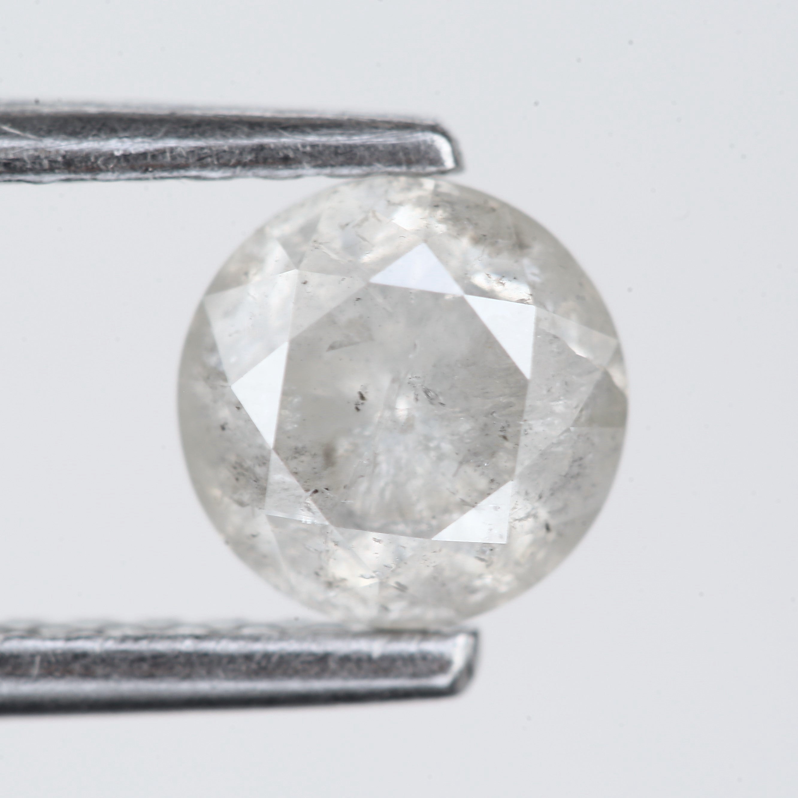 0.66 Carat Opalescent Salt and Pepper Round Shape Diamond 5.3 MM