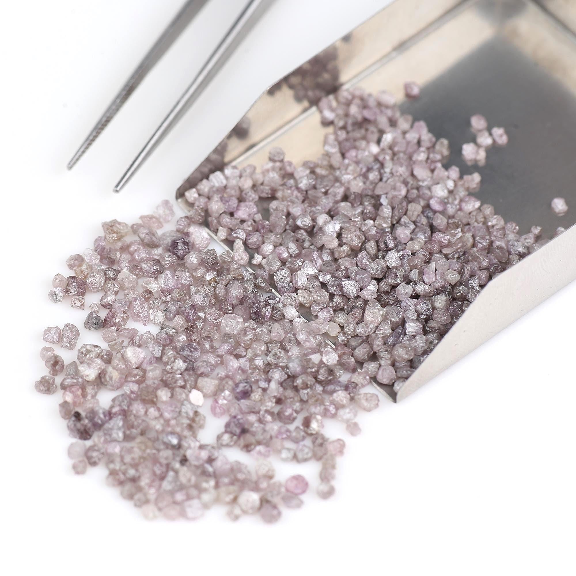 Raw diamonds on a white background