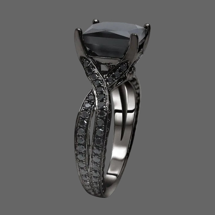 princess Black diamond ring with intricate design on a white background