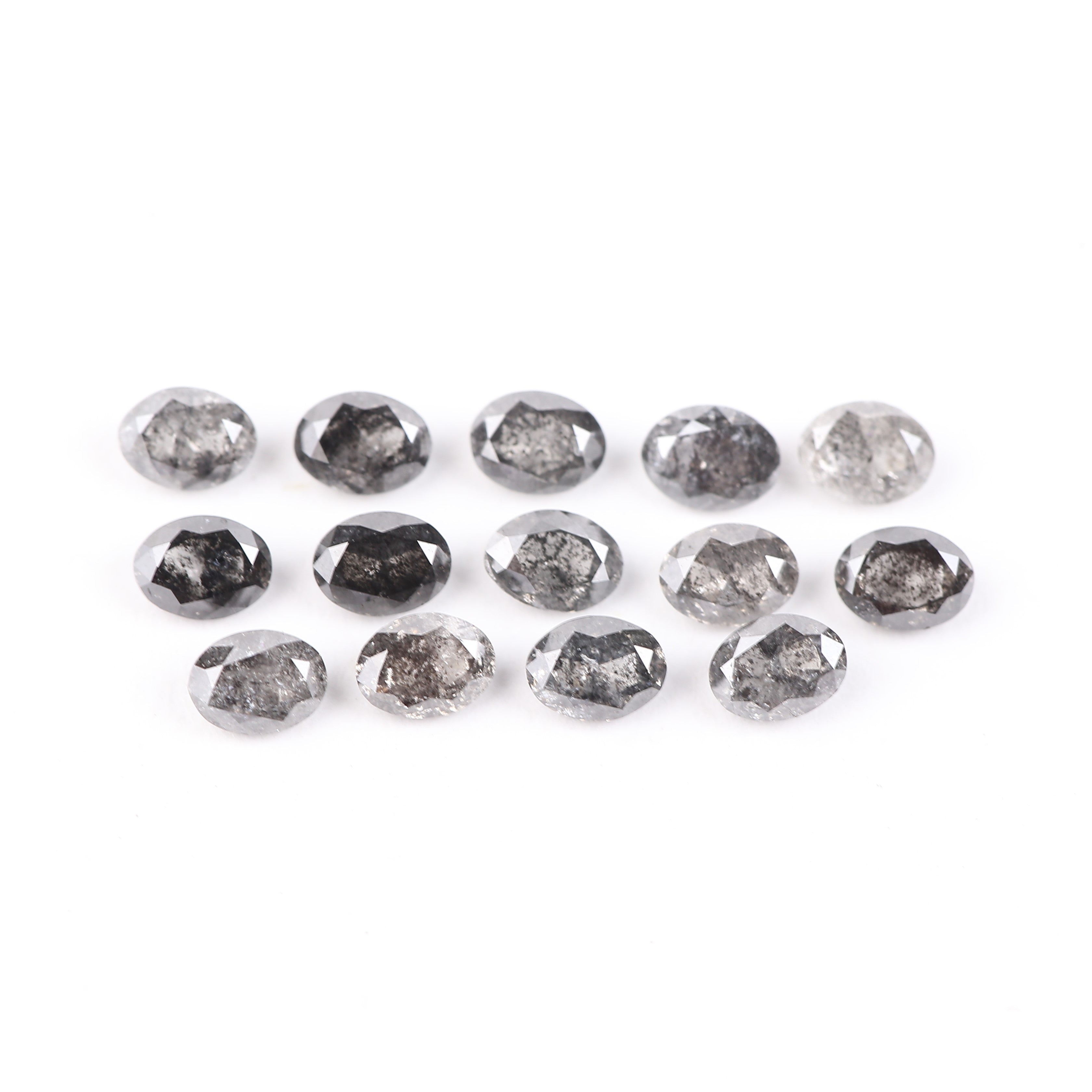 Ethical loose oval diamond with salt and pepper pattern